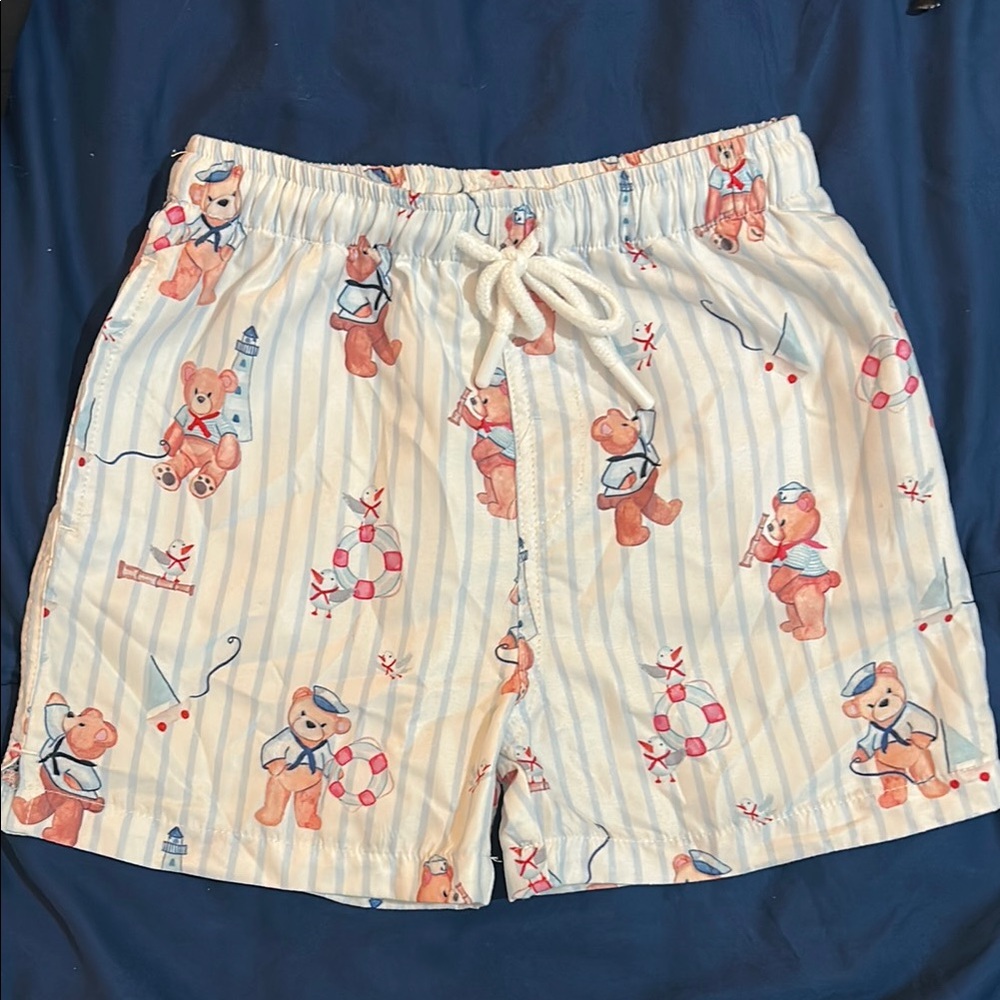Boys posh peanut swim shorts like new